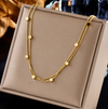 18 Karat Gold Plated Necklace with small squares