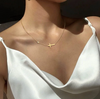 18 Karat Gold Plated necklace with a cross and a classic rhinestone