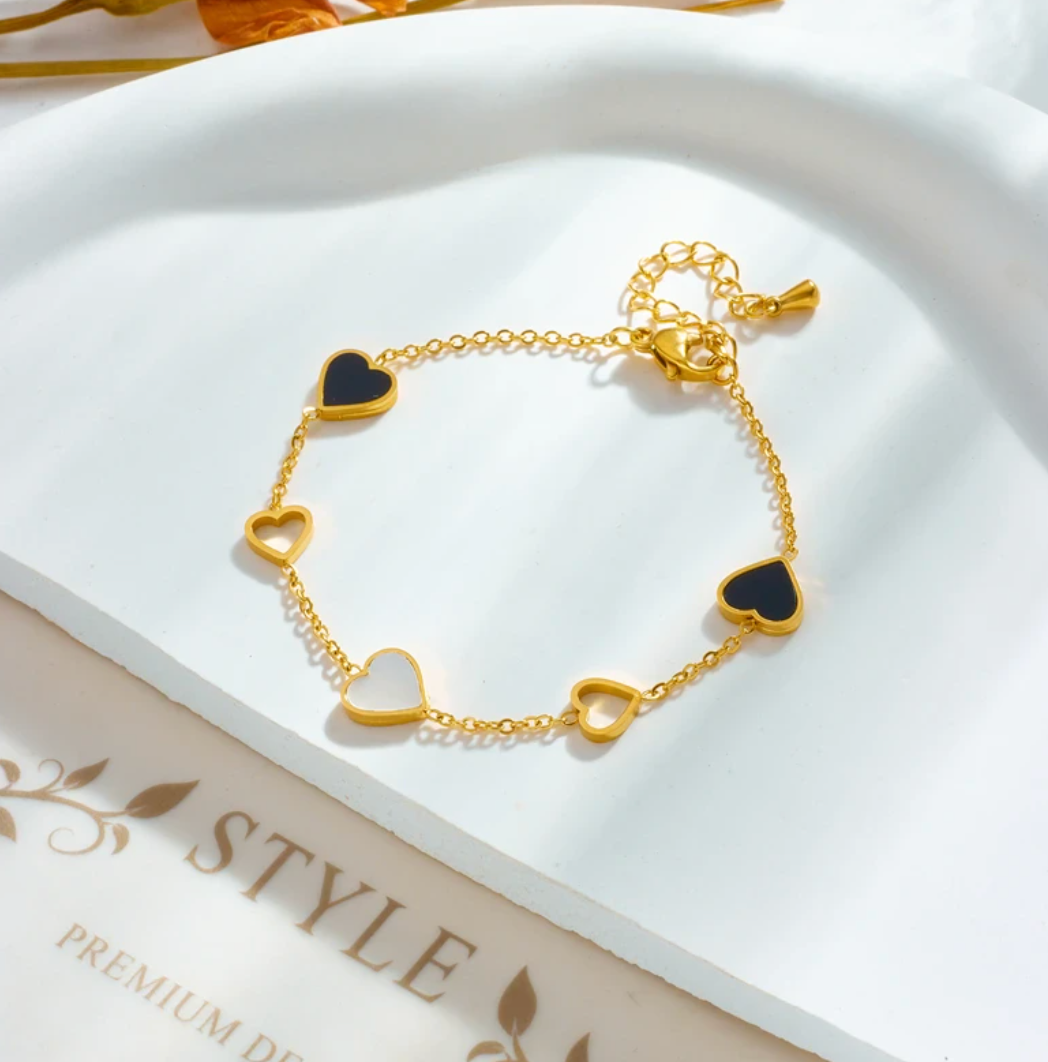 18 Karat Gold Plated bracelet with black and white hearts