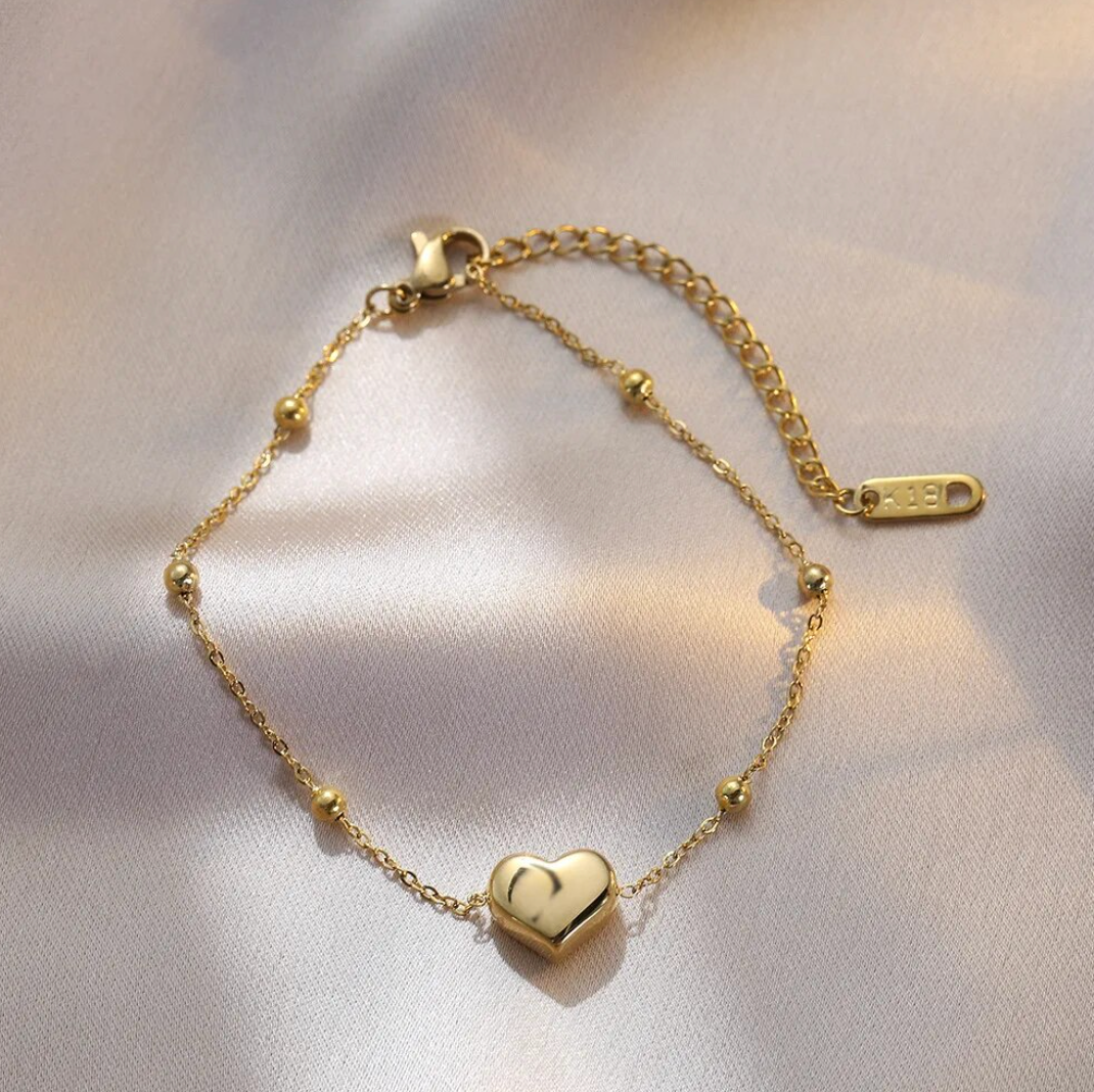 18 Karat Gold Plated bracelet with unique solid heart and beads