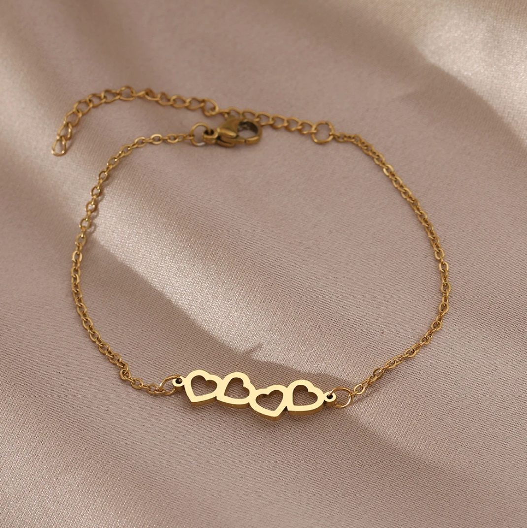 18 Karat Gold Plated bracelet with 4 hearts